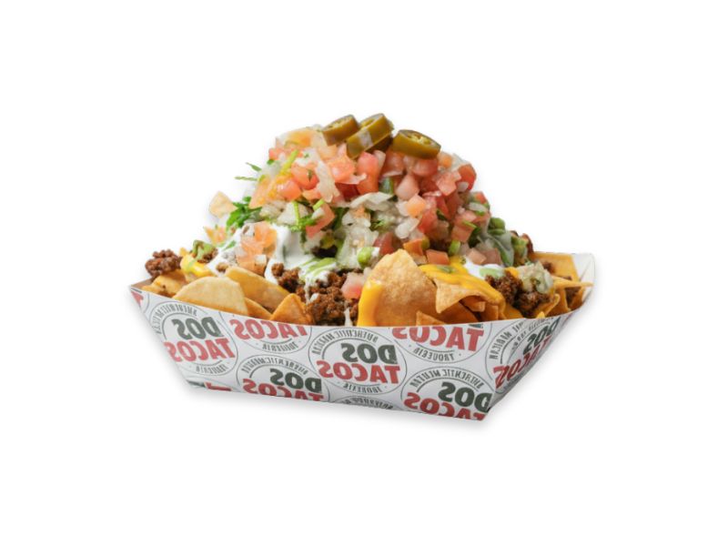 A heaping tray of loaded nachos from Dos Tacos, featuring tortilla chips, ground beef, melted cheese, sour cream, pico de gallo, and sliced jalapeños.